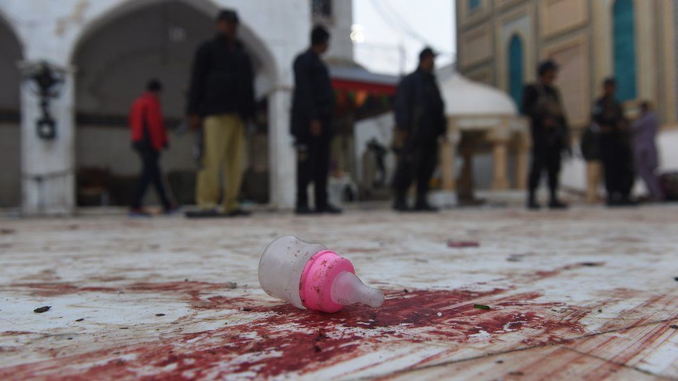 A baby feeder lies on the blood-stained floor at the 13th century Muslim Sufi shrine of Lal Shahbaz Qalandar a day after a bomb attack in the town of Sehwan in Sindh province, some 200km northeast of the provincial capital Karachi, on 17 February 2017