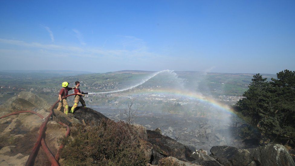 Fireman trying to put out the blaze