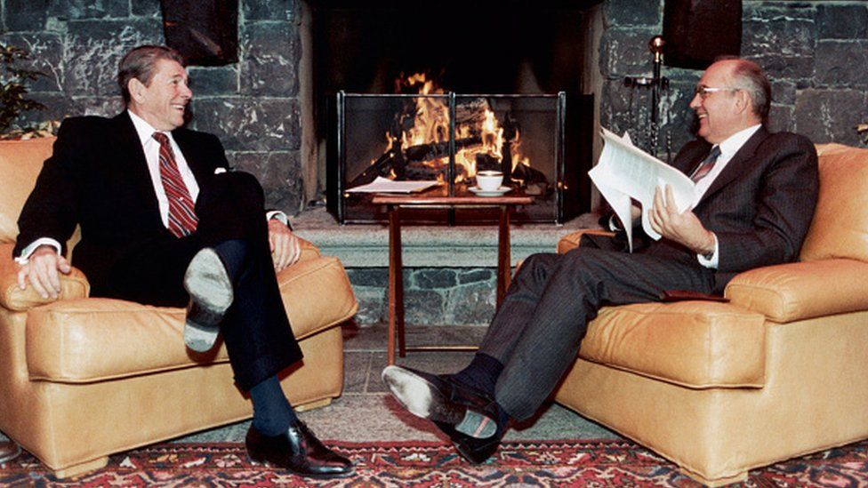 Ronald Reagan and Mikhail Gorbatchev share jokes on a break during the Geneva summit