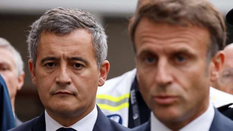 Gérald Darmanin (L) joined President Emmanuel Macron in Arras on 13 October after a teacher was fatally stabbed at a high school