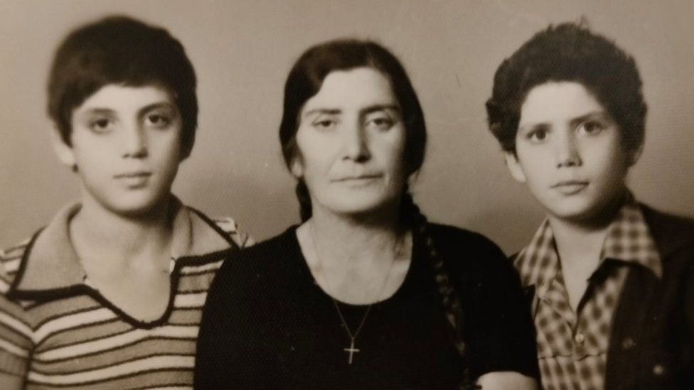 Eid Hadad, left, with mother and youngest brother in 1977