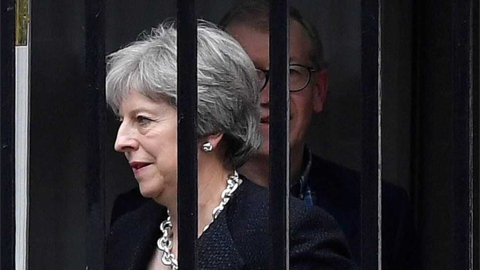 Theresa May leaves Downing Street on Thursday