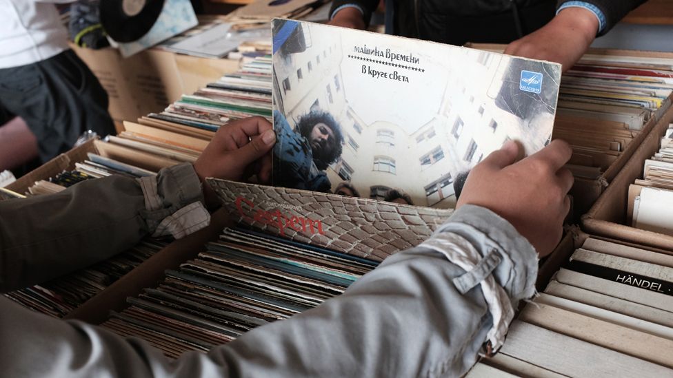 Person looking through records