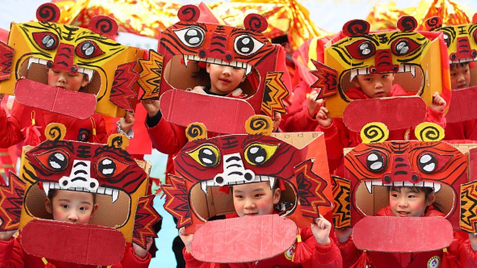 Kindergarten children dressed as tigers to welcome the 2022 Year of the Tiger in Nanjing