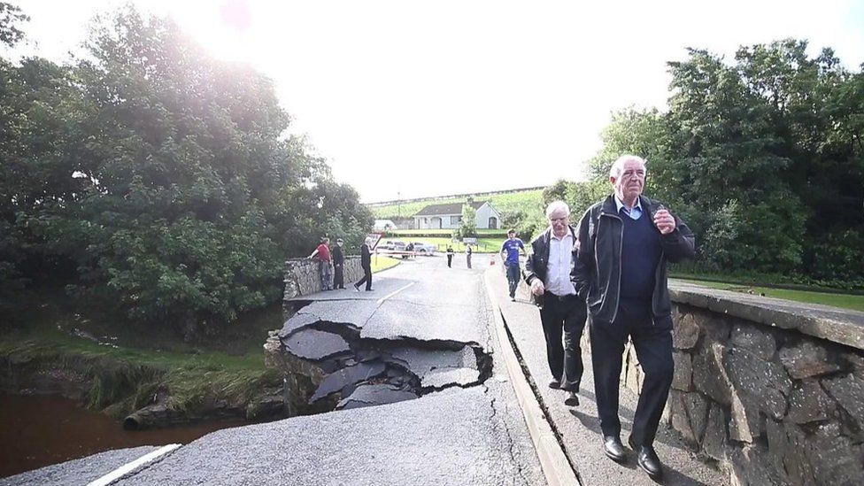 The Ballynameen Bridge in Claudy collapsed during flash floods in August