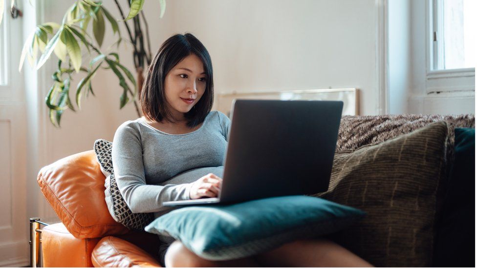 Woman working from home - stock shot