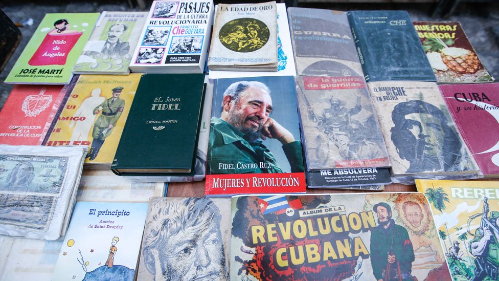 A view of a street stand with Fidel Castro, Raul Castro, Che Guevara and Cuba related books, souvenirs and memorabilia for sale, in Havana's city centre