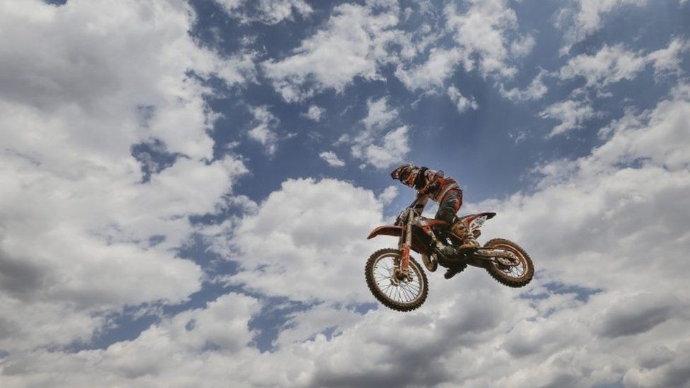 An African rider competes during the FIM AFRICA Motocross of African Nations Continental Championship held in Nairobi, Kenya, 21 August 2016. This year's annual continental championship saw riders representing South Africa, Kenya, Uganda, Botswana, and Zambia including women and children