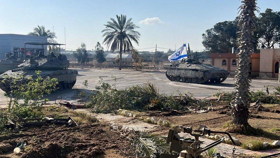 Israel Defense Forces (IDF) handout photo showing Israeli tanks at the Palestinian side of the Rafah crossing between Gaza and Egypt (7 May 2024)