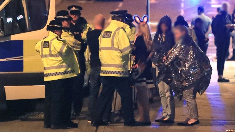 People in the aftermath of the Manchester Arena attack