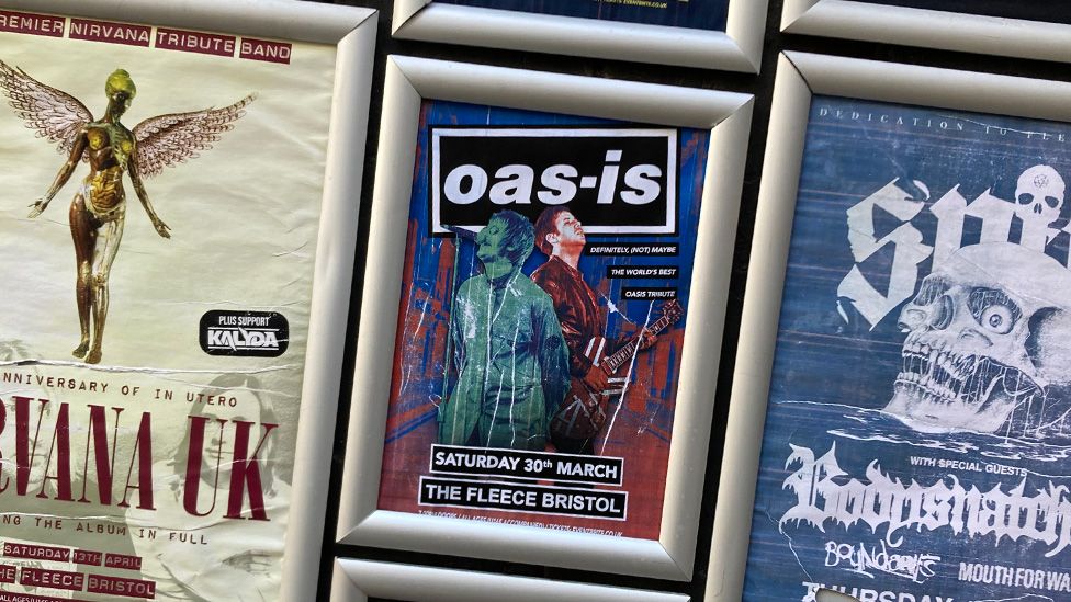 Poster for Oasis tribute band Oas-is outside the Fleece in Bristol