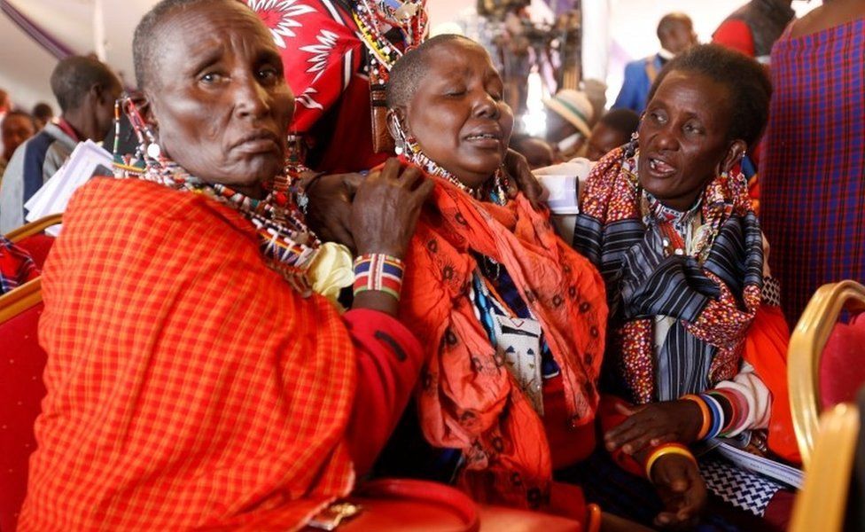 Maasai women mourn Kenya's Interior Minister Joseph Nkaissery before his burial ceremony in Ilbissil village of Kajiado county, Kenya, July 15, 2017.