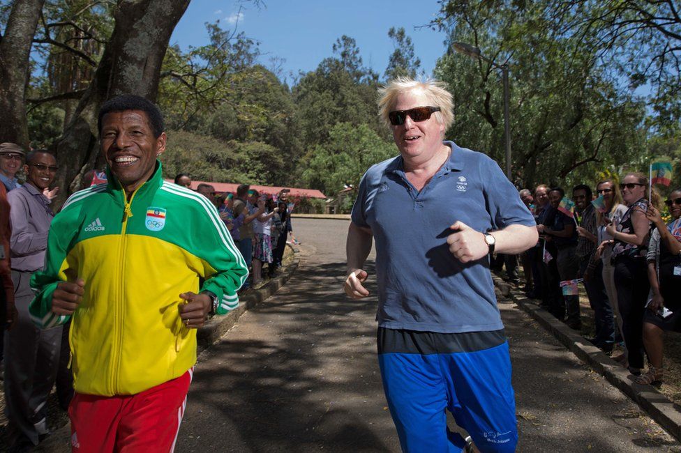 British Foreign Secretary Boris Johnson running along with retired Haile Gebrselassie, Ethiopia's legend of field and track