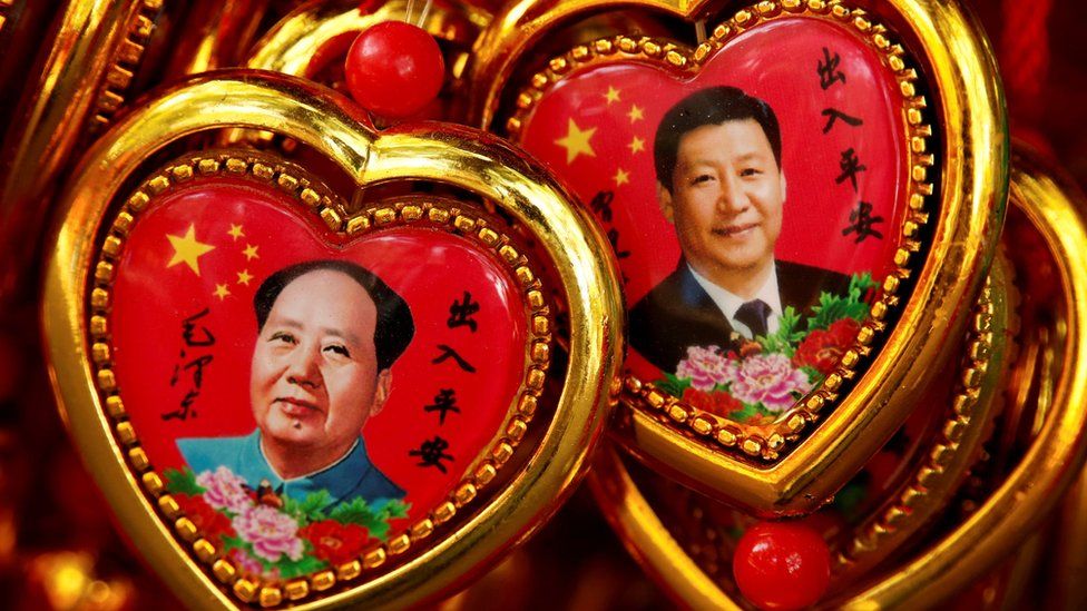 Souvenirs featuring portraits of China's late Chairman Mao Zedong and China's President Xi Jinping are seen at a shop near the Forbidden City in Beijing, China 9 September 2016