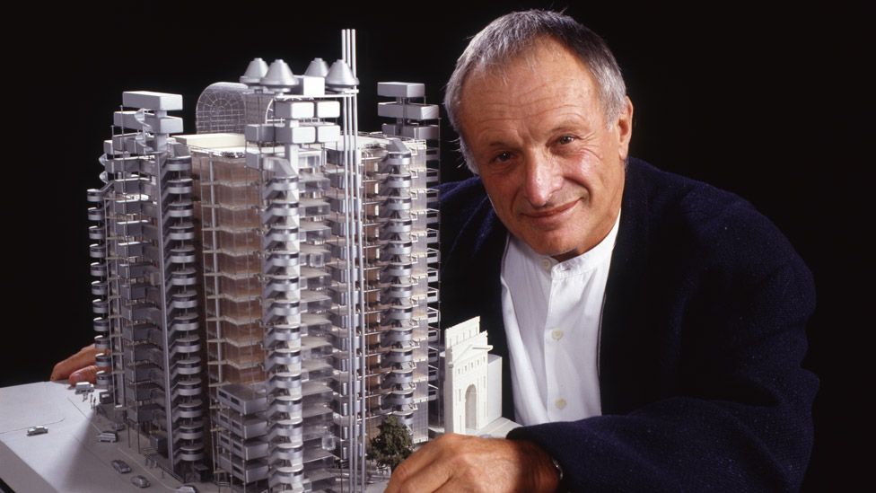 Richard Rogers with a model of the Lloyds building in 1995