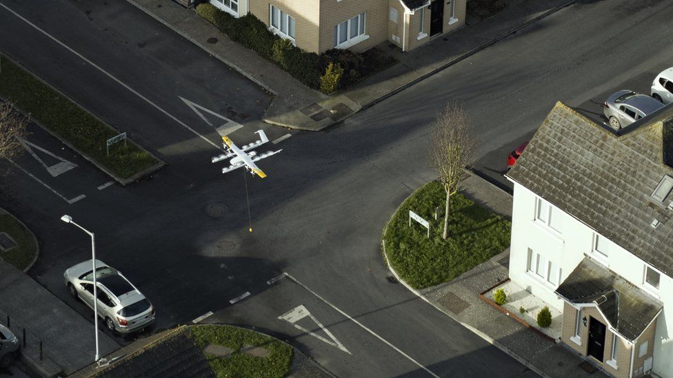 A Wing drone flying over a crossroads in Lusk, Ireland