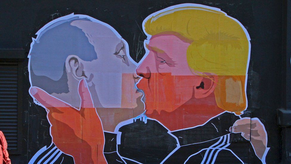 Graffiti showing Vladimir Putin and Donald Trump embracing