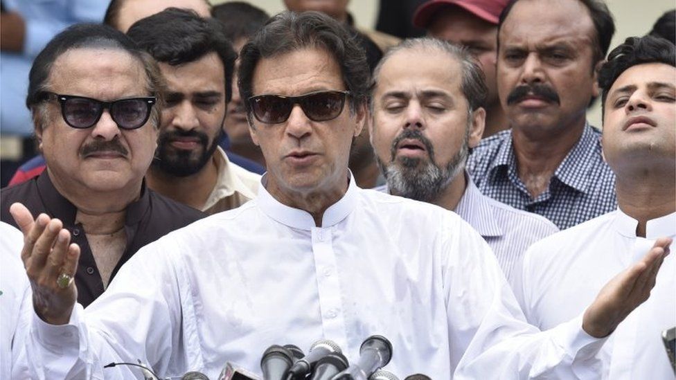 Imran Khan, head of Pakistan Tehrik-e-Insaf (PTI) speaks to journalists after casting his ballot at a polling station during general elections in Islamabad, Pakistan, 25 July 2018.