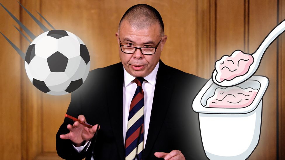 Prof Jonathan Van-Tam with a cartoon football and yoghurt