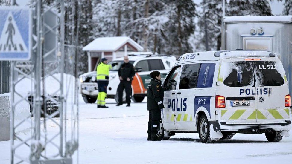 A view of Finnish border guards and police at the Raja-Jooseppi international border crossing station