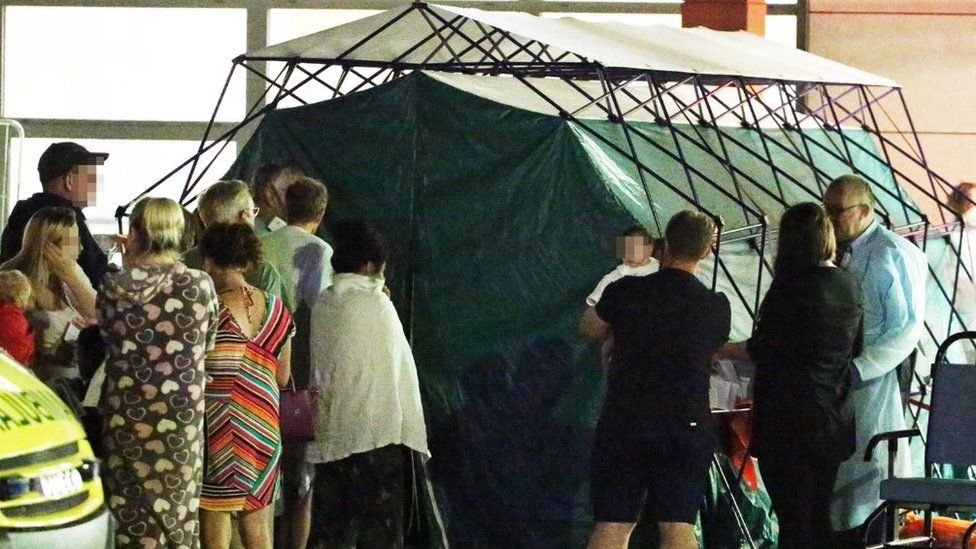 A tent dealing with people at the hospital