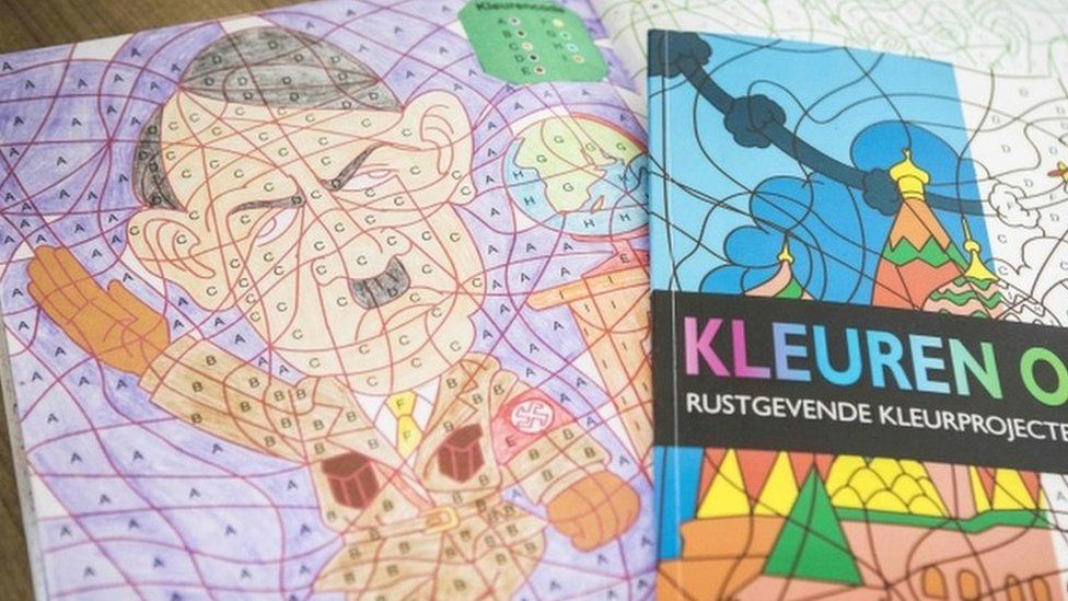 A photo shows a colouring book with an image of Adolf Hitler bought at the Dutch store Kruidvat by Ray Vervloed in Pijnacker, the Netherlands, on April 5, 2017