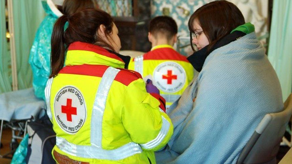An emergency response volunteer for the Red Cross charity