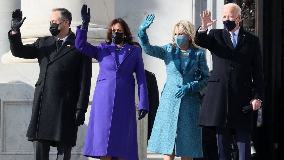 Second husband Doug Emhoff, Vice-President Kamala Harris, First Lady Jill Biden, and President Joe Biden wave to the crowd