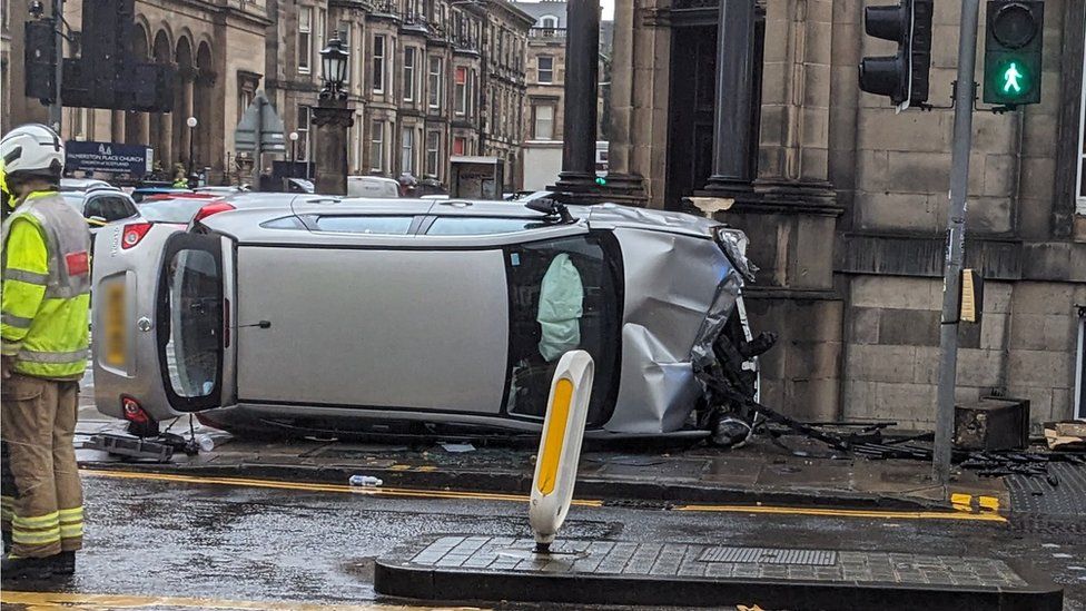 Baby and man in hospital after car flips and crashes in Edinburgh BBC