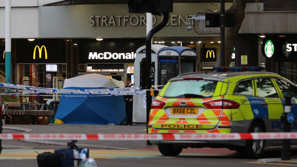 Police in Stratford, east London after a male teenager was fatally stabbed outside Stratford Broadway