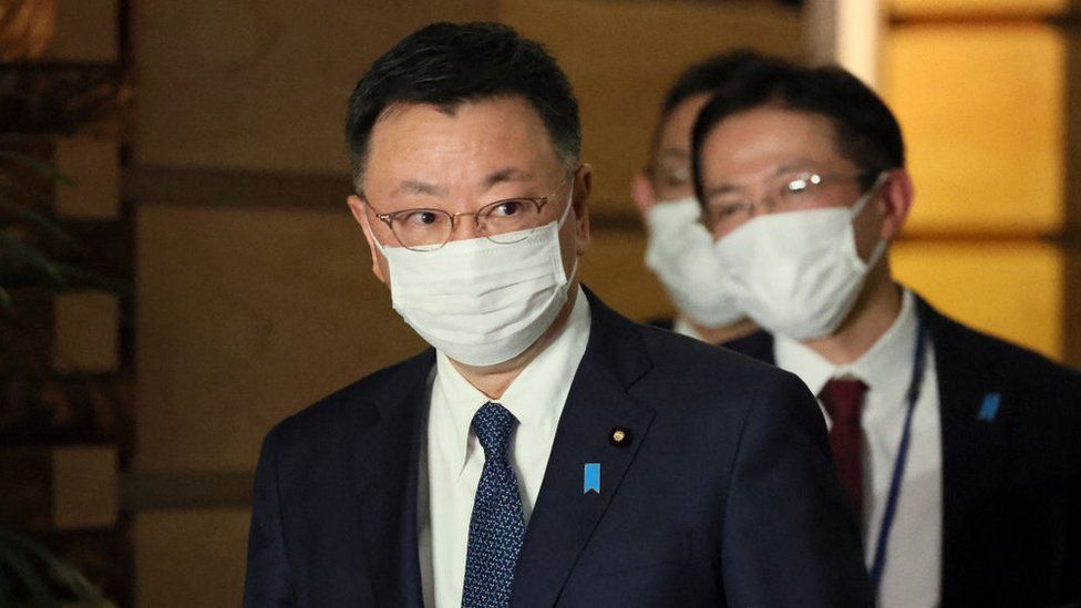 Japan's Chief Cabinet Secretary Hirokazu Matsuno emerges from a meeting in Tokyo.