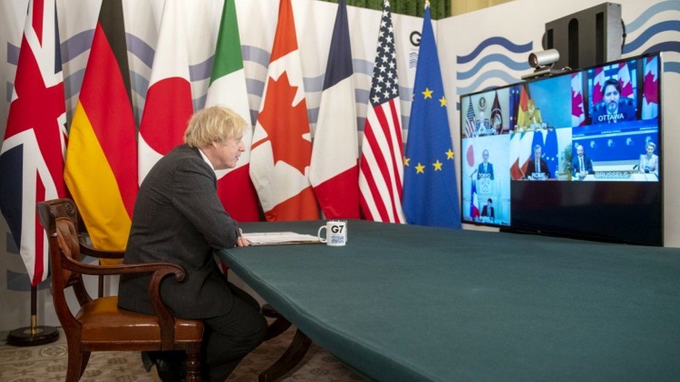 Prime Minister Boris Johnson in the Cabinet Room, Downing Street, London, hosting the G7 leaders for a virtual meeting to discuss worldwide distribtuion of coronavirus vaccines and preventing future pandemics.