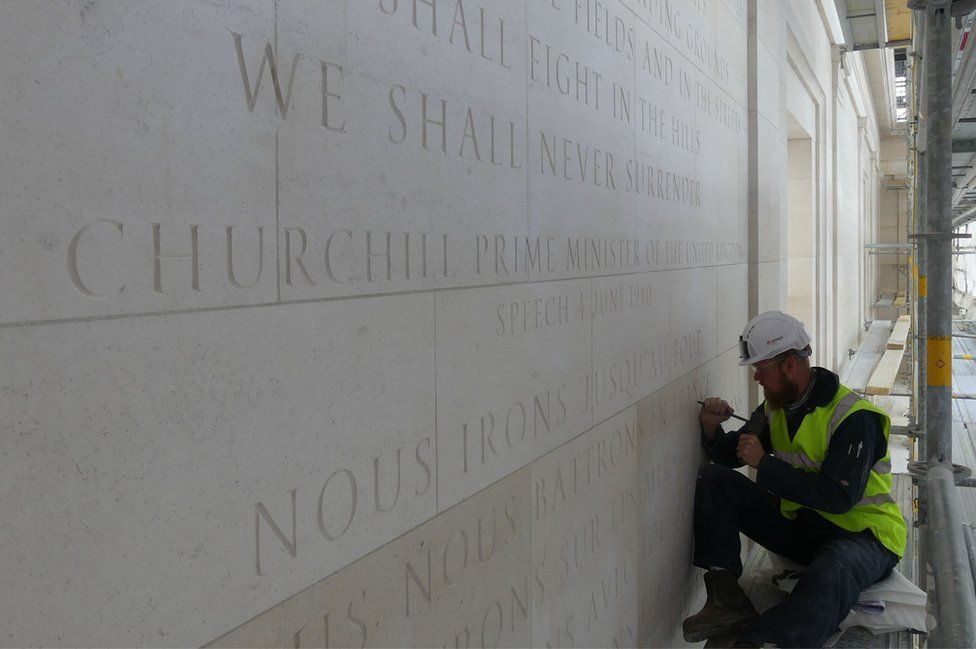 A letter carver at work at the British Normandy Memorial