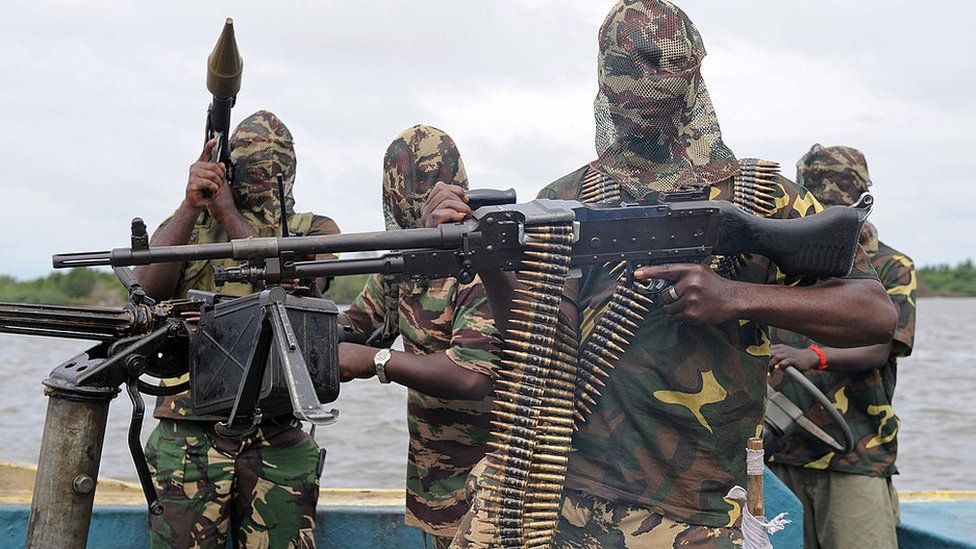 Fighters with the Movement for the Emancipation of Niger Delta (MEND) prepare for an operation against the Nigerian army in Niger Delta