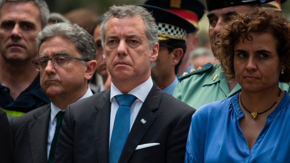 President of the Basque regional government Inigo Urkullu (centre) looks on beside Spanish Minister of Health, Social Services and Equality Dolors Montserrat (R) as they attend the ceremony marking the 30th anniversary of ETA attack against Barcelona's Hipercor supermarket in Barcelona on 19 June 2017