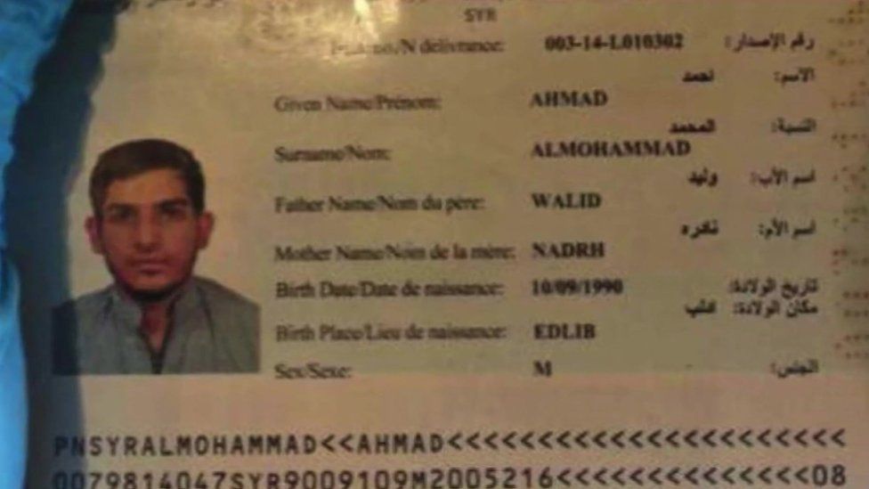 The passport, believed to be a forgery, found near the body of the attacker