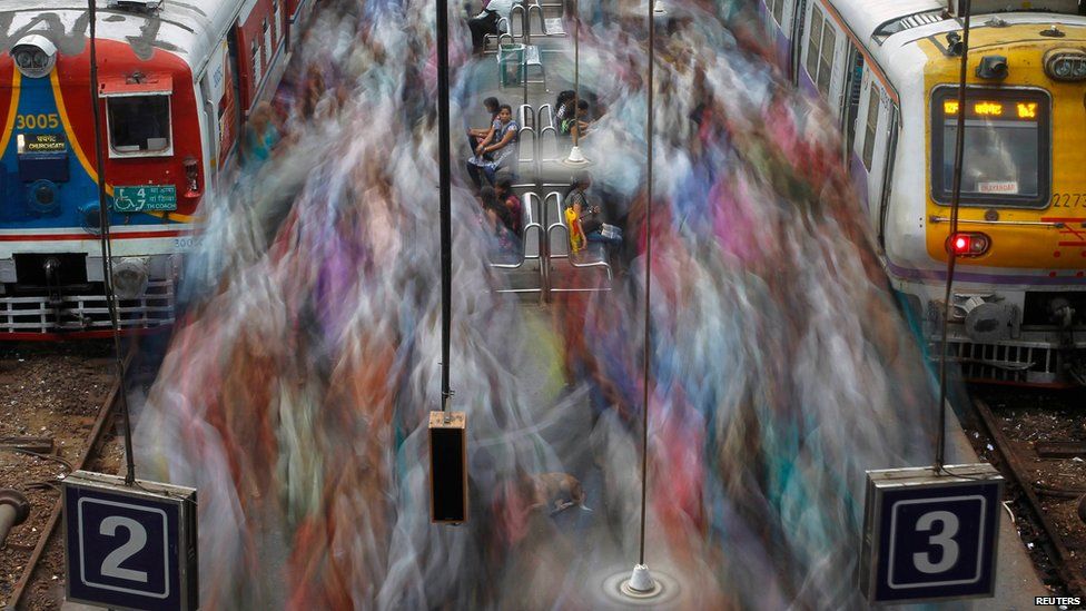 Commuters at Churchgate railway station in Mumbai in 2012