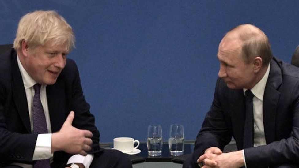 Prime Minister Boris Johnson and Russian President Vladimir Putin previously pictured during a meeting at an international summit on Libya in 2020