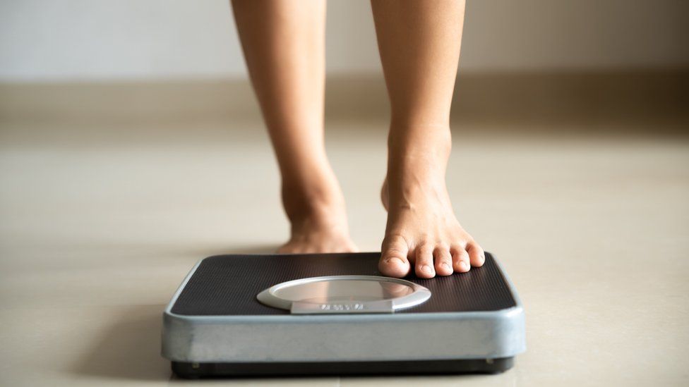 Woman on scales