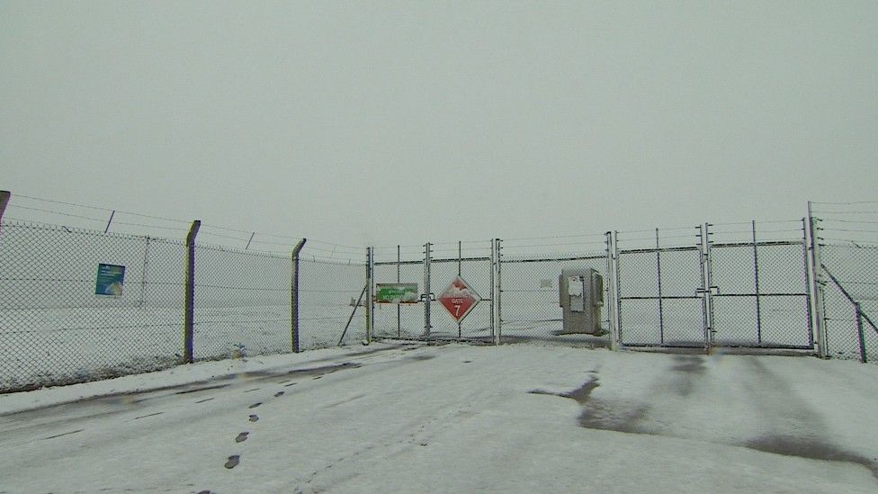 Snow by the gates of East Midlands Airport