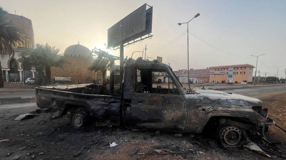 Burned out vehicle in Khartoum