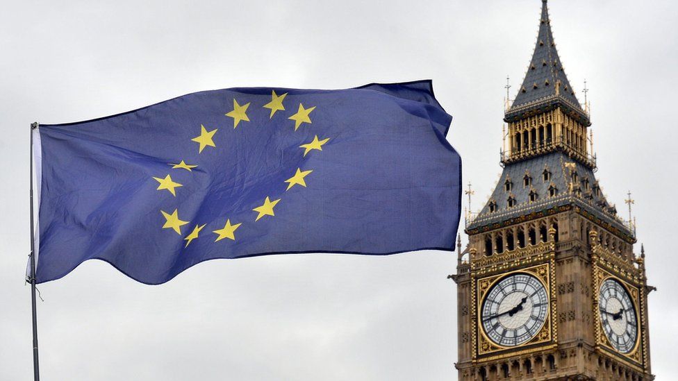 An EU flag flies in front of the Houses of Parliament in Westminster, London, 29 March