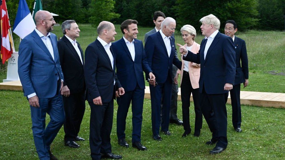 Image shows Boris Johnson and world leaders