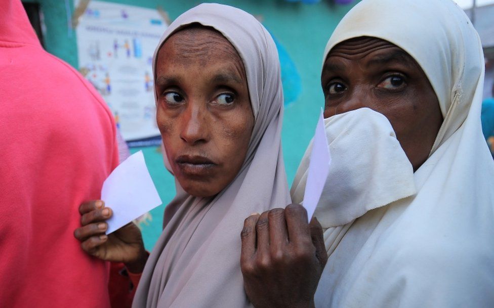 Voters queue up at a polling station during the Ethiopian parliamentary and regional elections, in Beshasha, Ethiopia, June 21, 2021