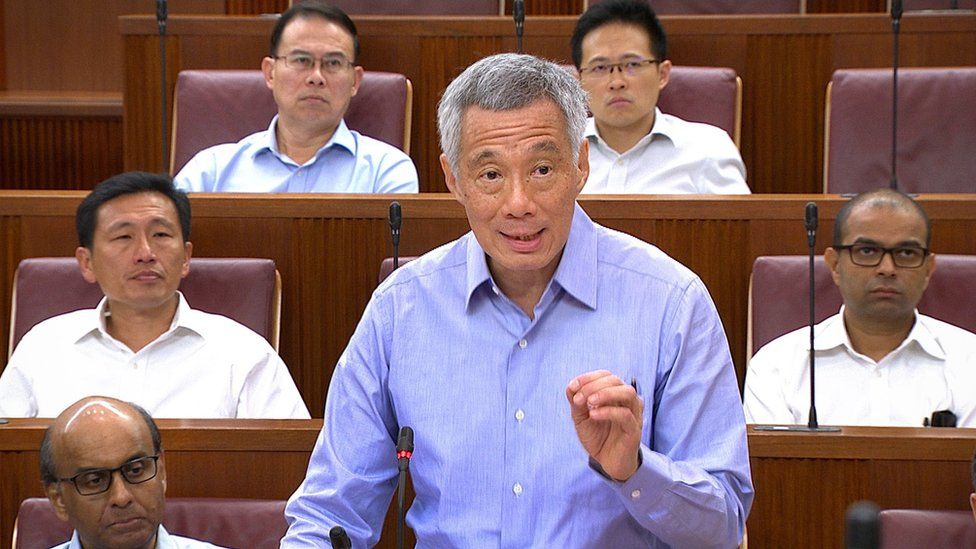 This handout photo released by the Ministry of Information and Communication (MCI) on 3 July 2017 shows Singapore Prime Minister Lee Hsien Loong speaking at parliament house in Singapore