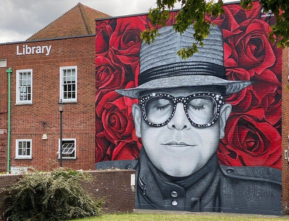 Mural of Sir Elton John on the side of Watford Library