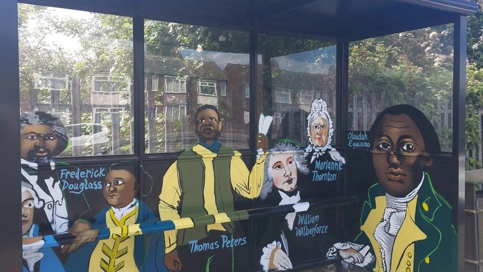 A bus shelter featuring William Wilberforce and other key slave trade abolitionists
