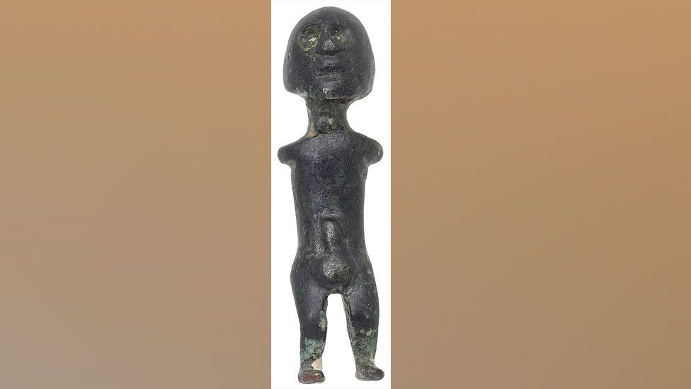 Front views of a male bronze 1st Century Celtic fertility figure 