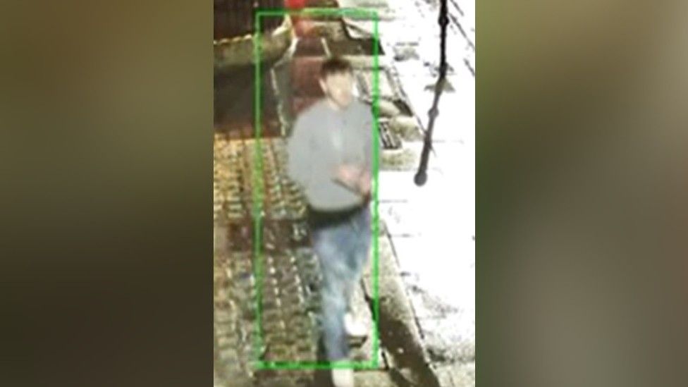 A CCTV image of a man