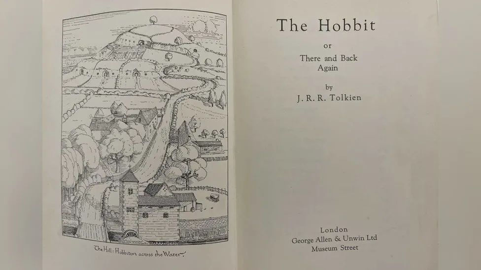 The title page of the book and an illustration of a countryside scene 